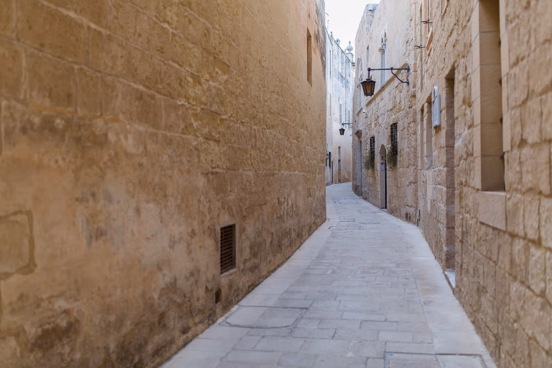 A narrow limestone alley in Mdina